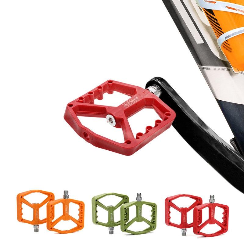 A Pair Of Nylon Bike Pedals For Mountain Riding - Red