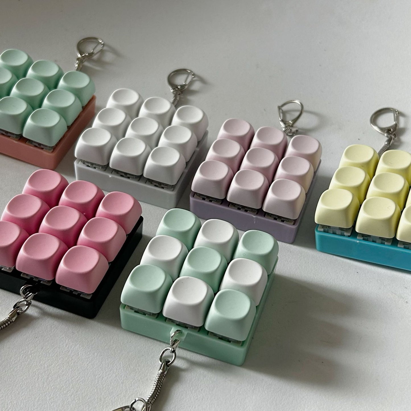 2-Pack Green Mechanical 9-Keyboard Fingertip Toy Keychain - Key Pressure Relief, PVC Fingertip Toy